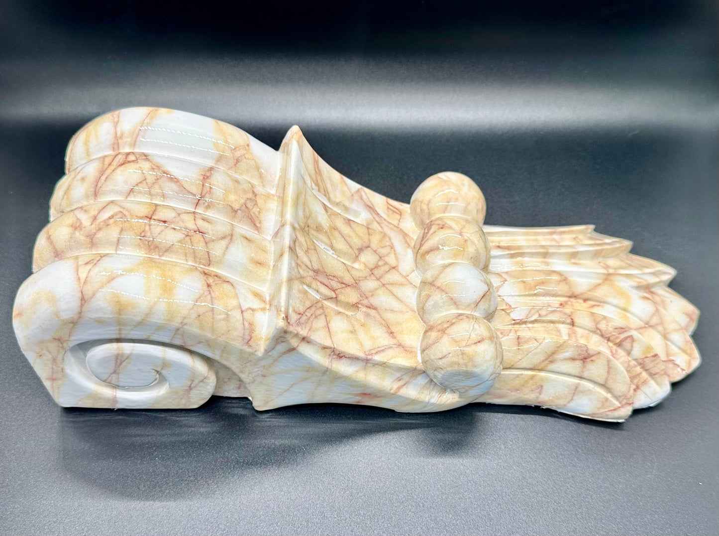 Pair of decorative wood corbels with marble finish.