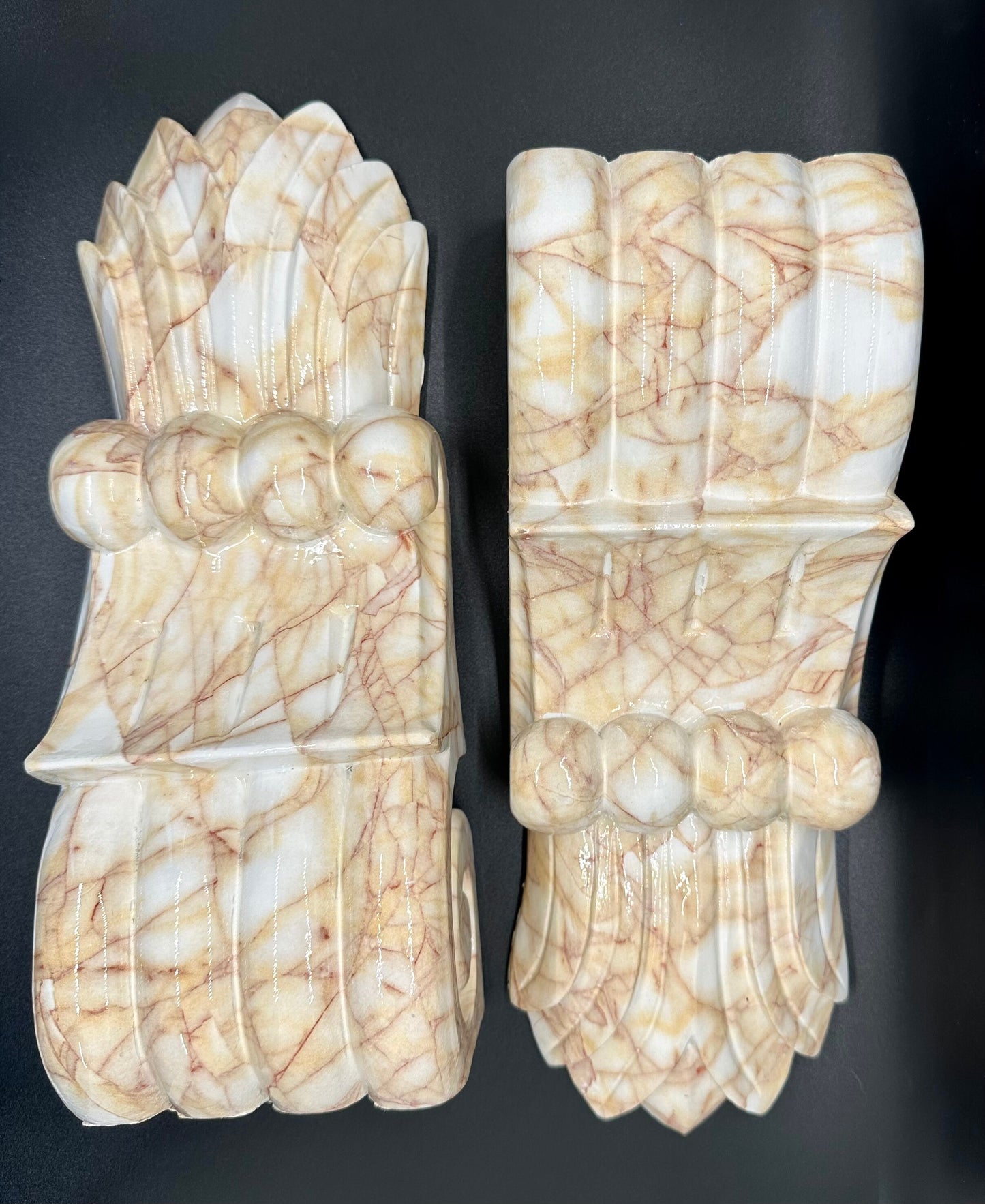 Pair of decorative wood corbels with marble finish.
