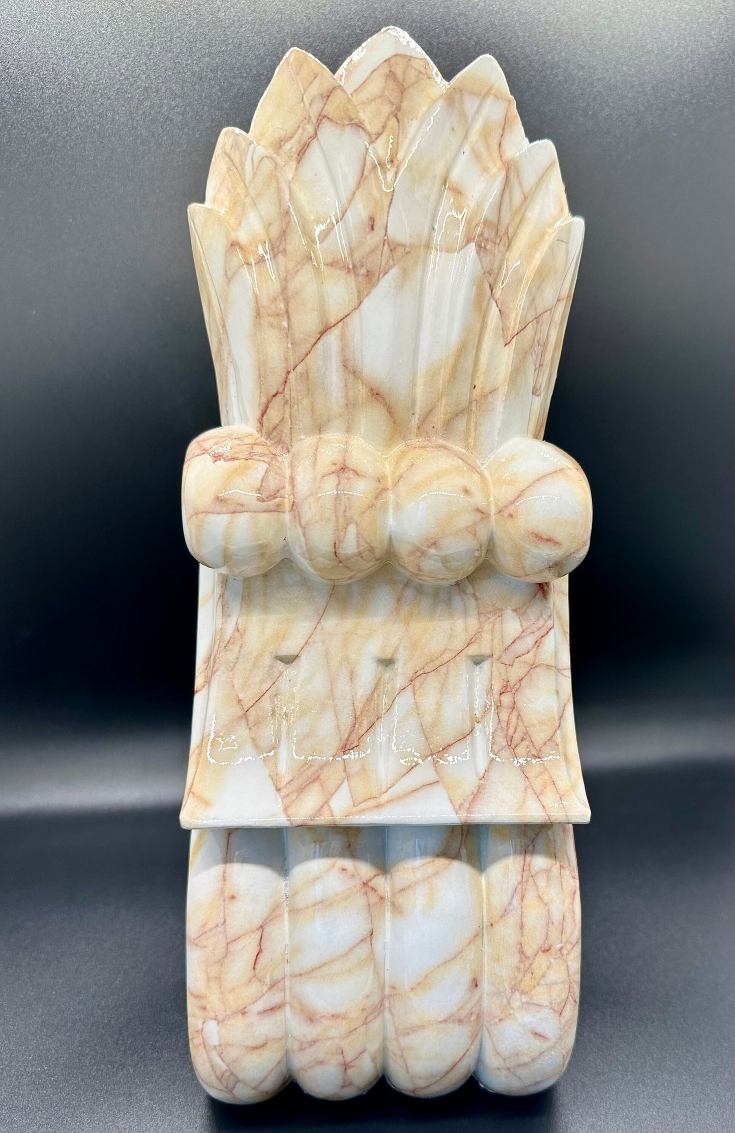 Pair of decorative wood corbels with marble finish.