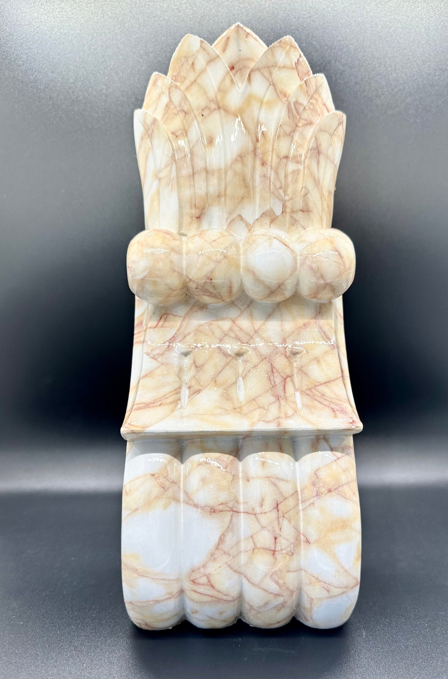 Pair of decorative wood corbels with marble finish.